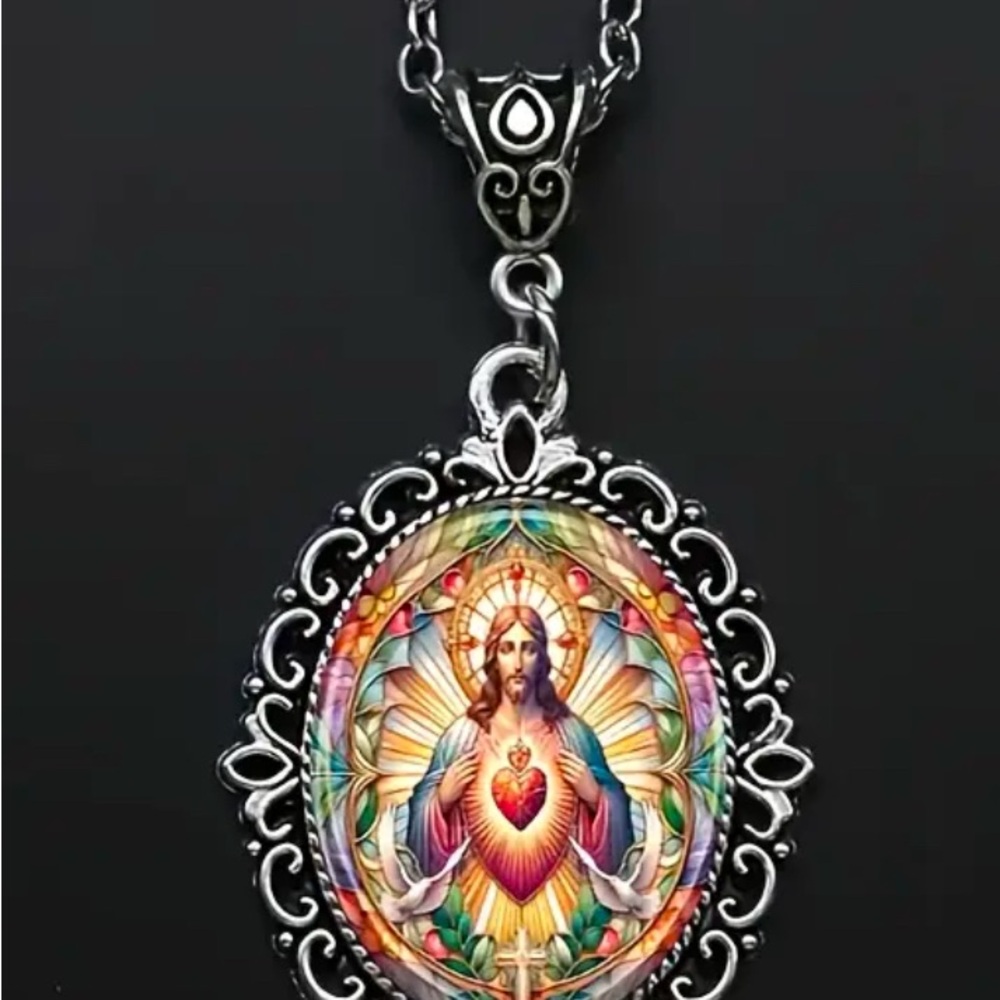 Silver and Red Pendant Necklace with Ornate Filigree Design